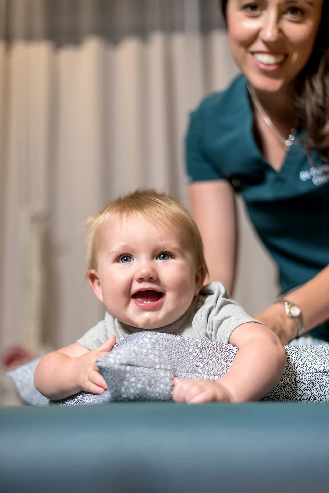 Pediatric chiropractor with a baby