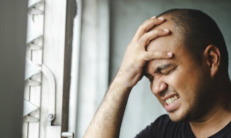 Man suffers from intense headache